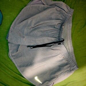 these are nike running gray shorts. they’ve only been worn a few times.